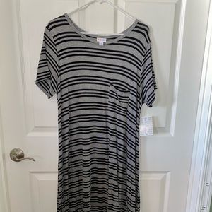 Brand new - Black and grey stripped L Carly